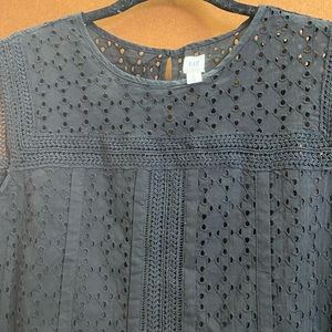 Gap, size 14, black eyelet dress with built-in slip. Side slit pockets.